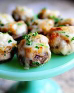 Шампиньоны под сыром в духовке