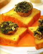 Шампиньоны с зеленым маслом