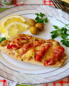 Тилапия запеченная в духовке с помидорами