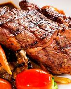 Стейк рибай на гриле с овощами