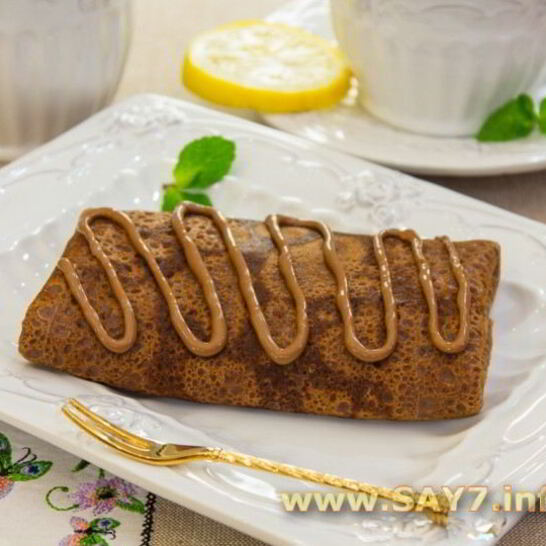 Рецепт шоколадные блинчики с бананами и орехами