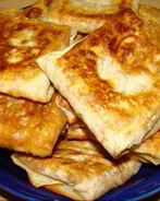 Горячая закуска в лаваше с ветчиной