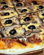 Пицца с анчоусами